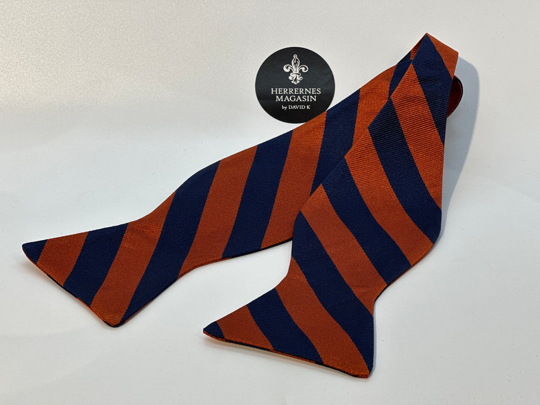 Butterfly selvbinder Stribet Orange og navy bredstribet