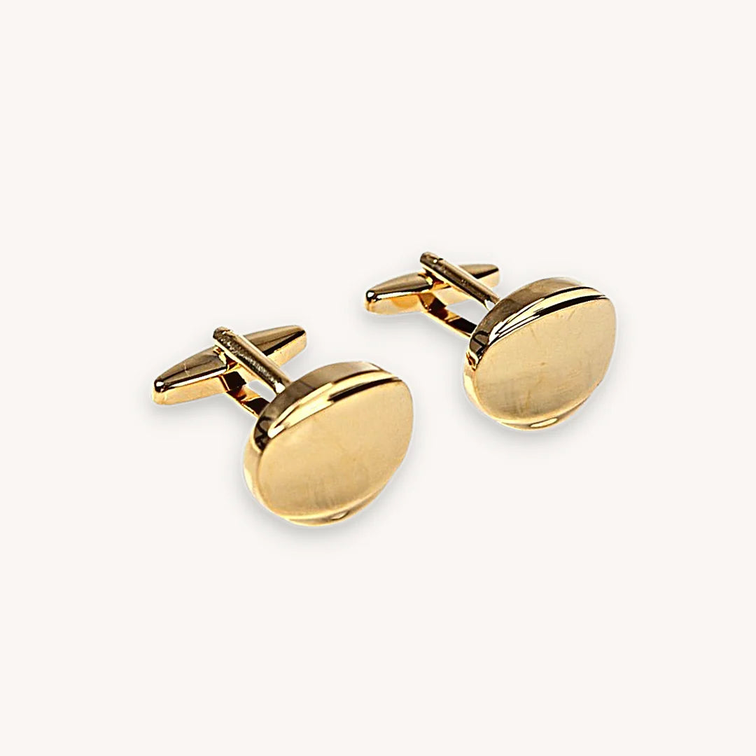 Manchetknapper semi oval i guld farven