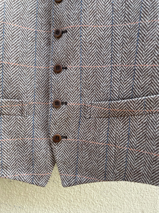 Brun herringbone vest med skjult tern