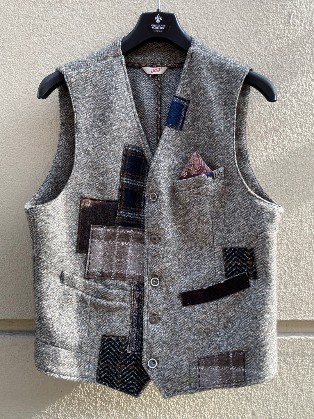 Grøn vest med sildeben og patchwork