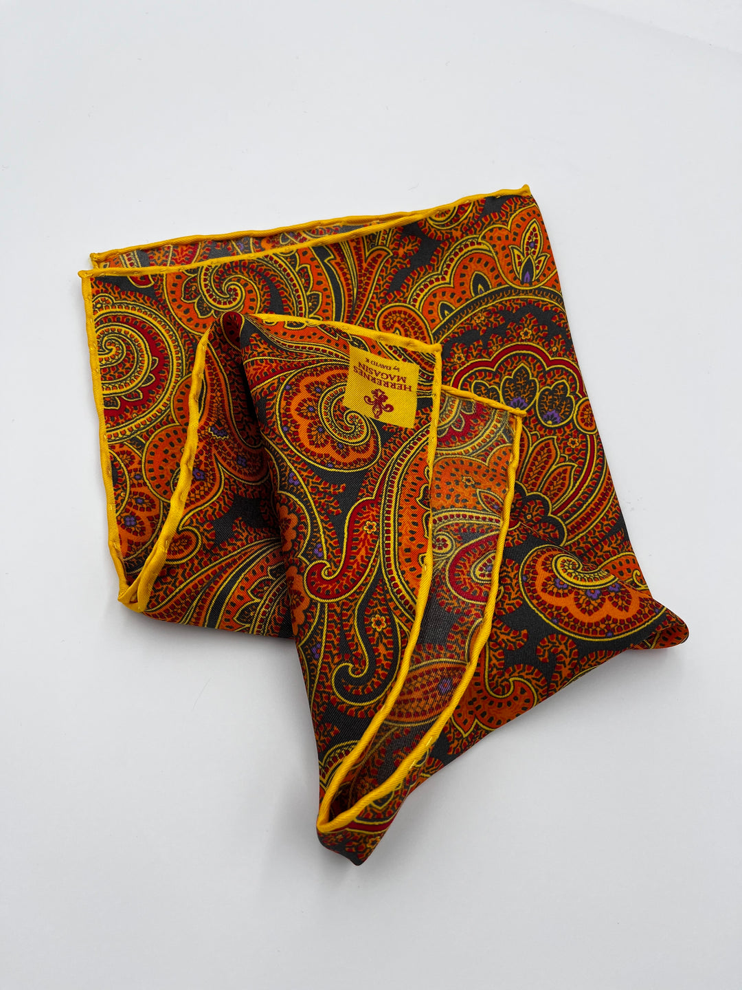 Orange neckertie med paisley mønster