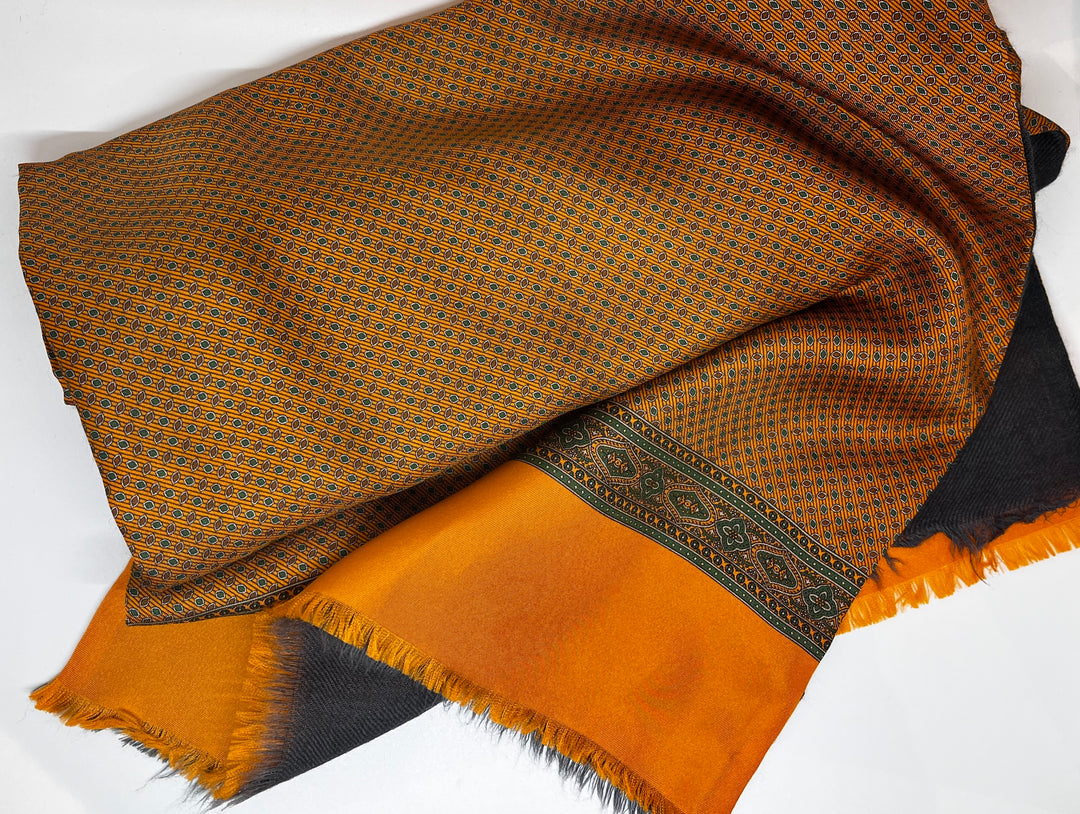 Orange wool/silk scarf in a birdseye pattern