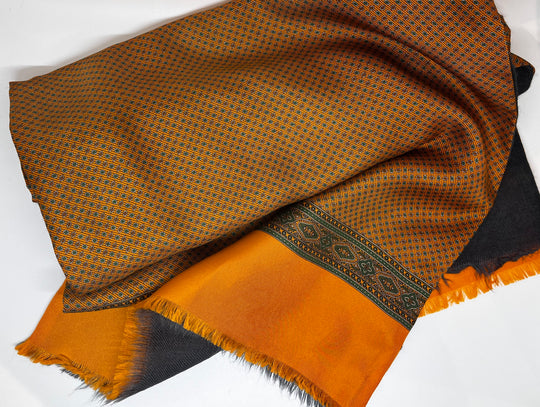 Orange wool/silk scarf in a birdseye pattern