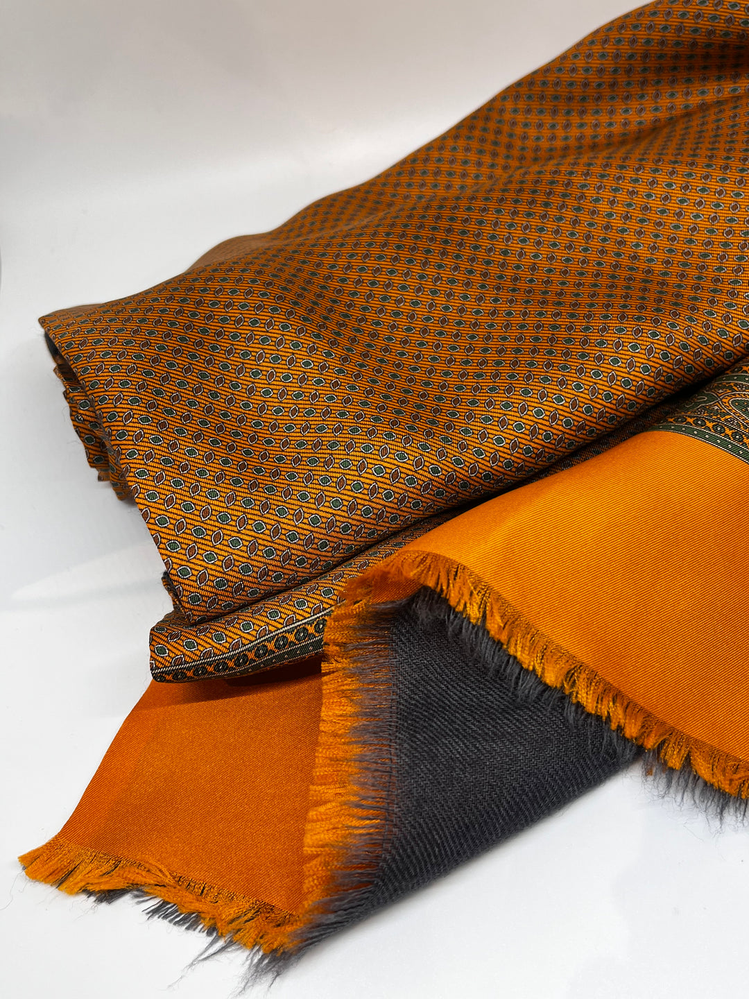 Orange wool/silk scarf in a birdseye pattern