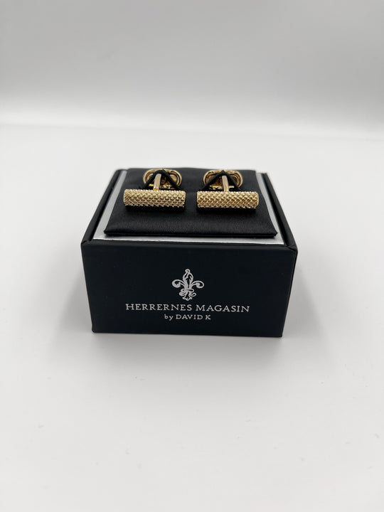 Cylinder manchetknapper i farven guld