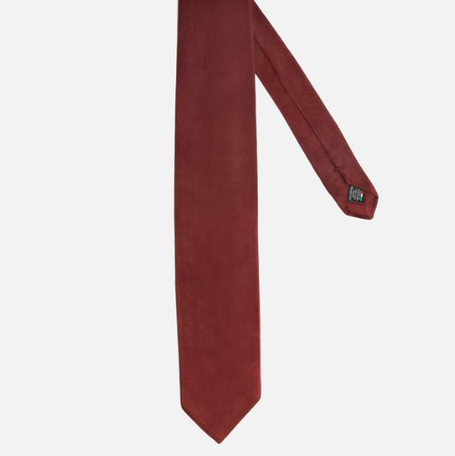 Et lækkert italiensk slips lavet i lammeskind. Fåes også som klud.